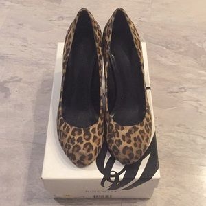 Well loved animal print heels